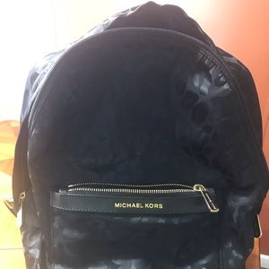 Michael Kors back pack, black leopard print.